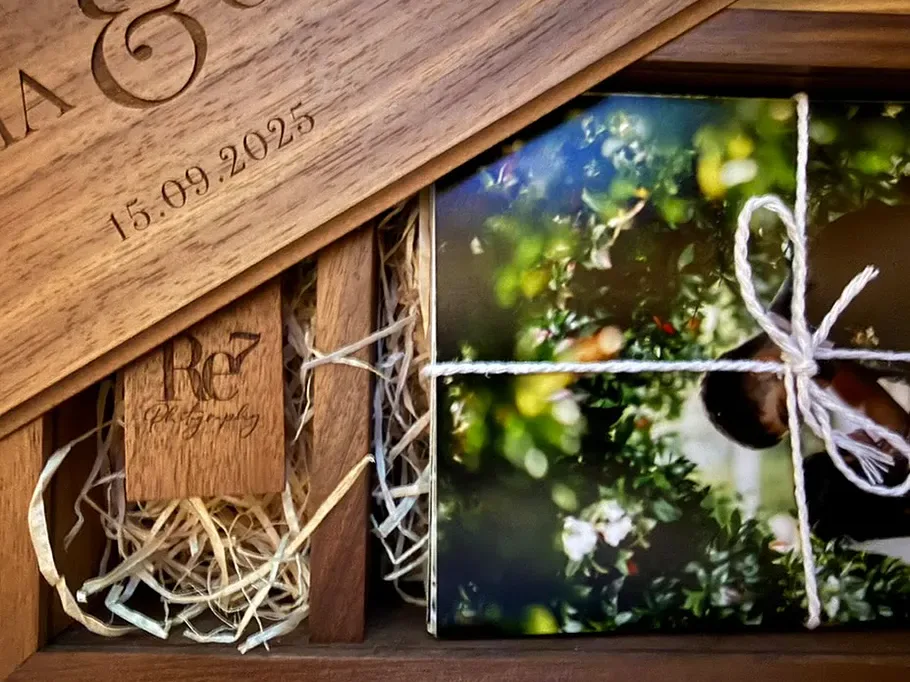 Engraved wooden memory box with prints